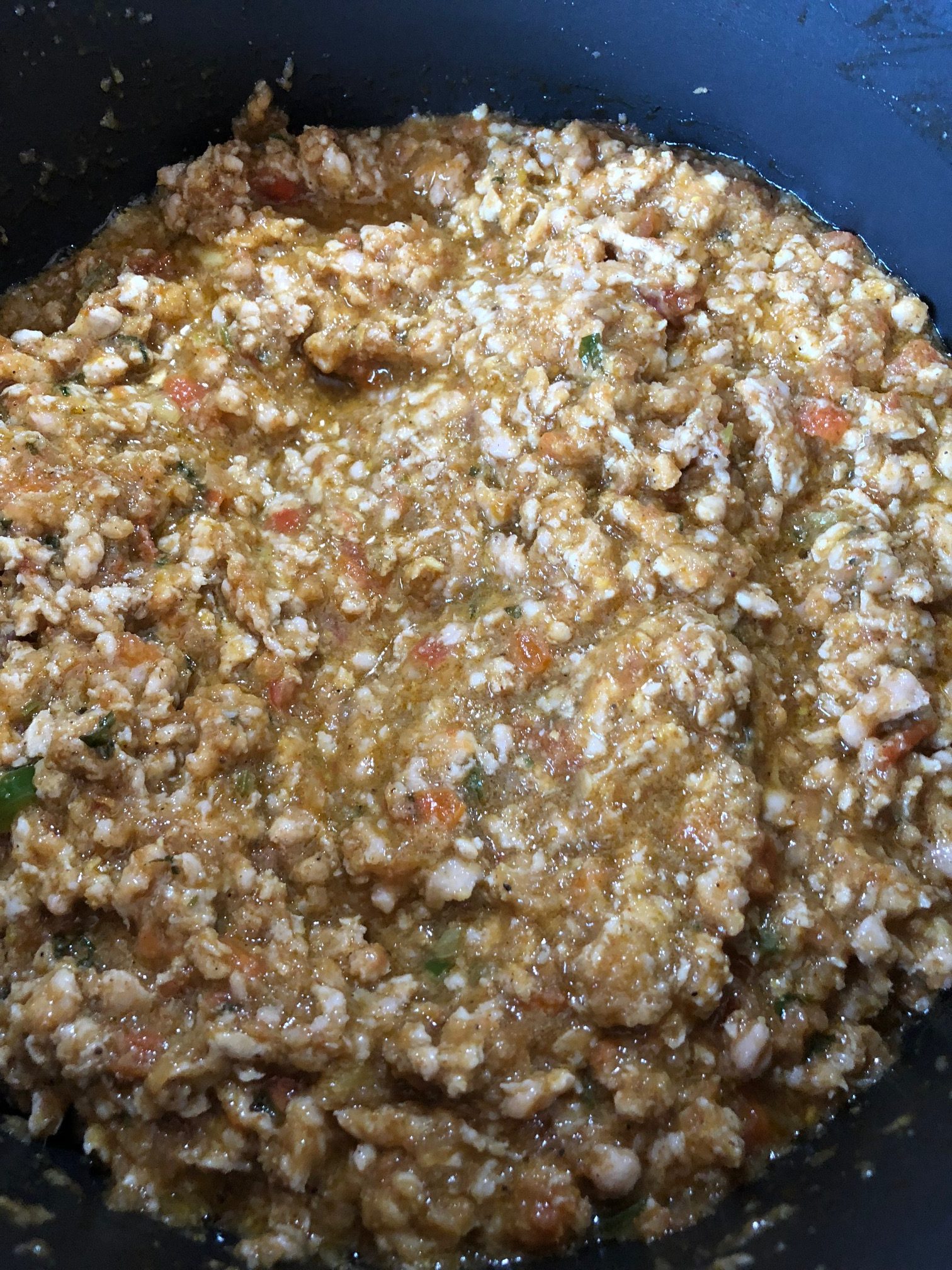 ground chicken being cooked with spices