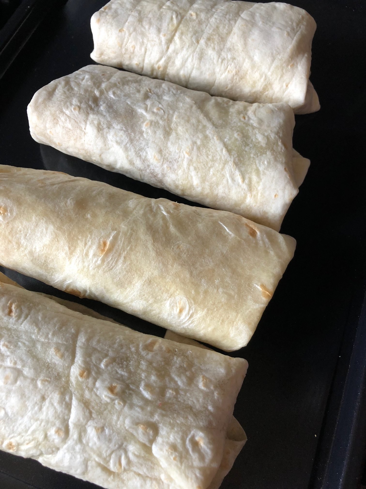 4 rolled burritos