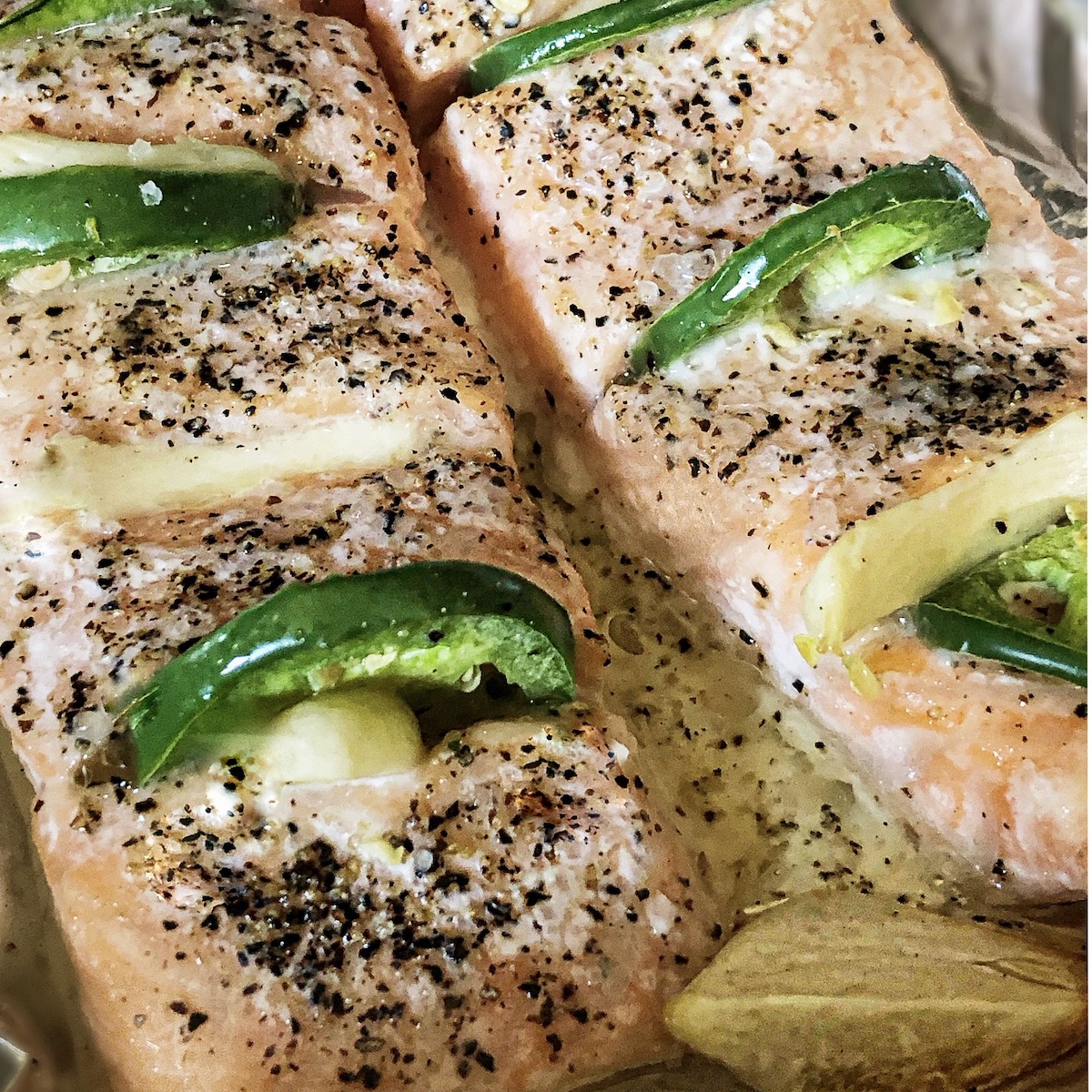 baked chili salmon with green chili peppers and coarse pepper