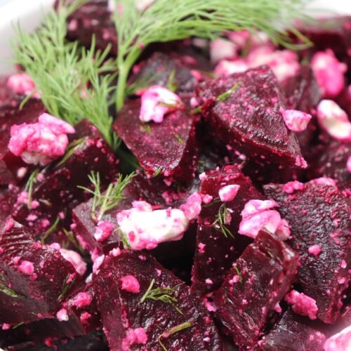 A steamed red beet salad with dill and feta cheese.