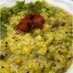 A slow cooked Gujarati porridge with rice, lentils, vegetables, and spices.
