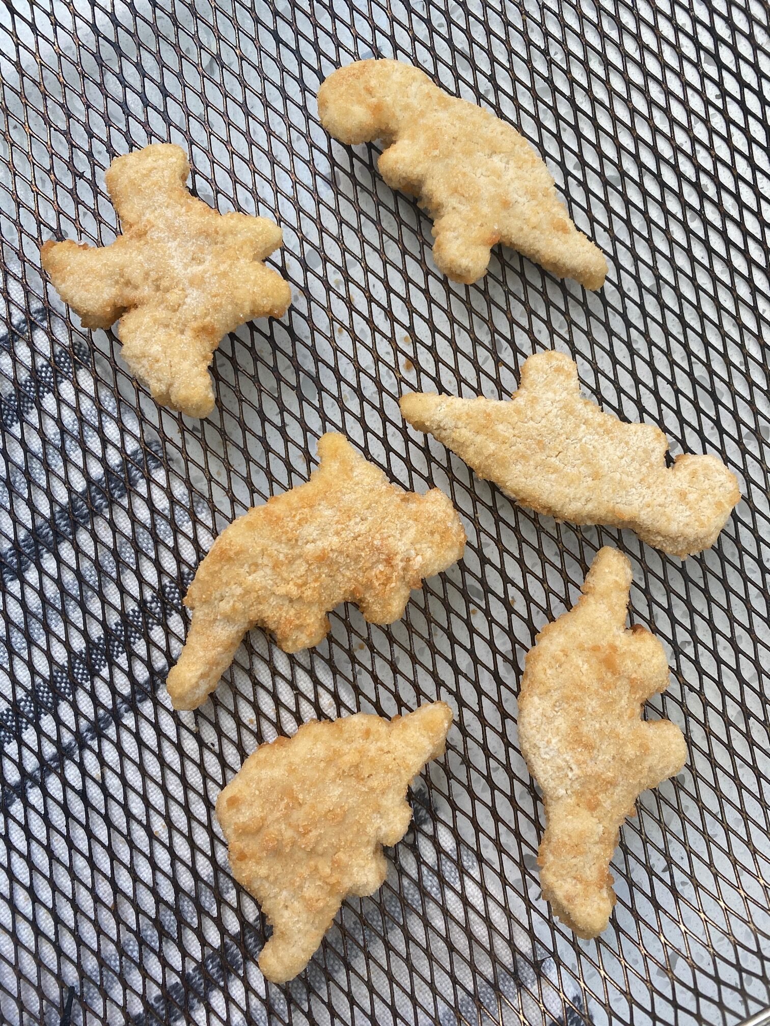 frozen dinosaur nuggets on a basket