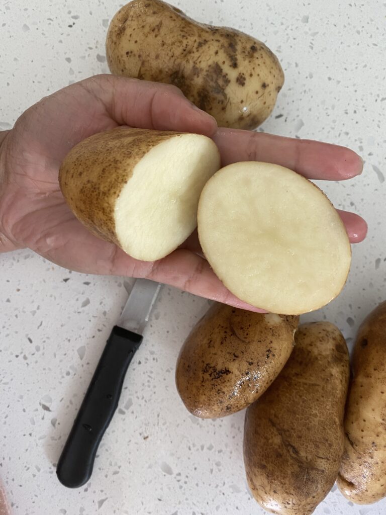 russet potato cut in half