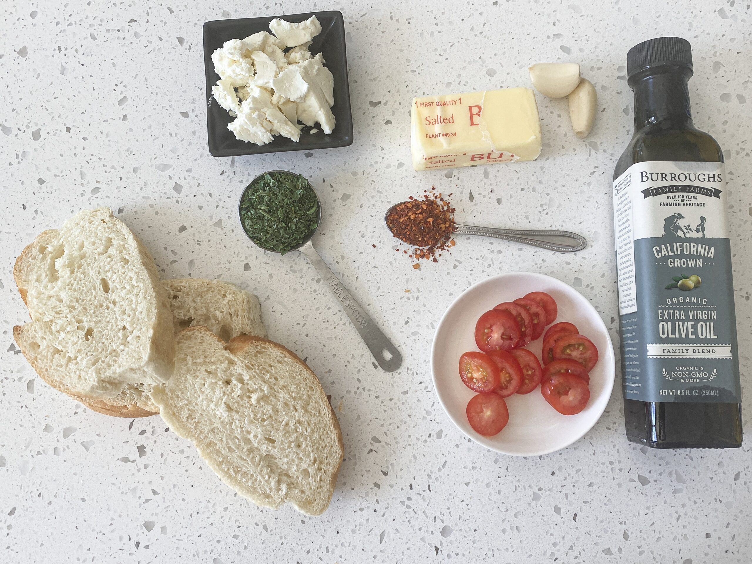 ingredients for toasted baguette and mediterranean cheese