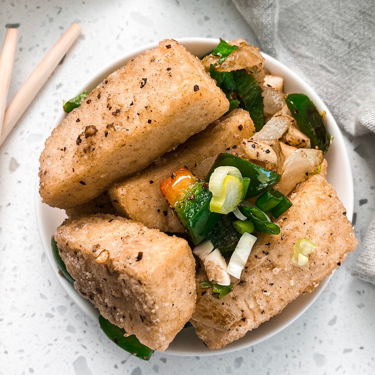 a bowl full of a favorite chinese take out recipe salt and pepper tofu fried crispy