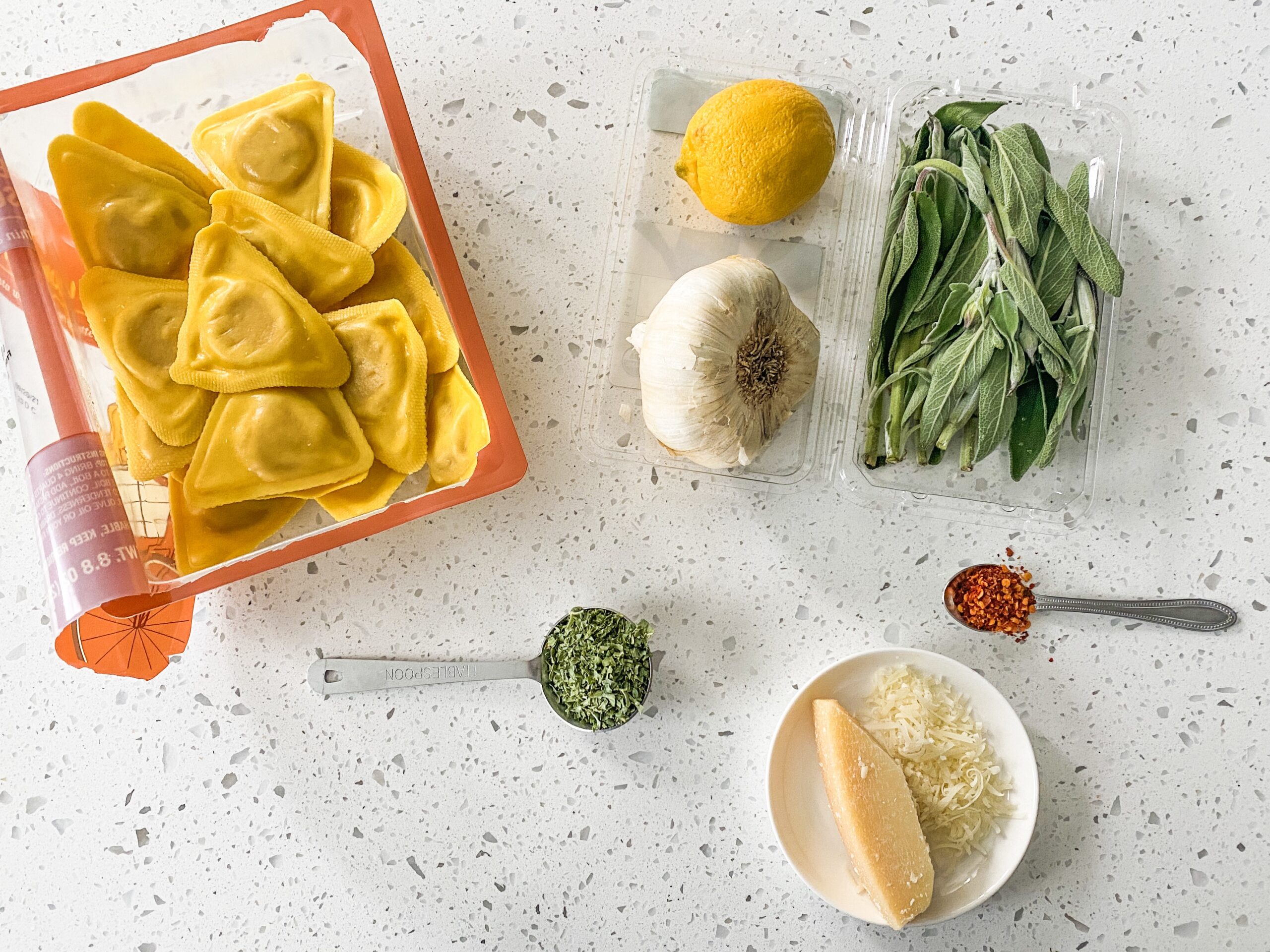 ingredients on a table for butternut squash ravioli sauce